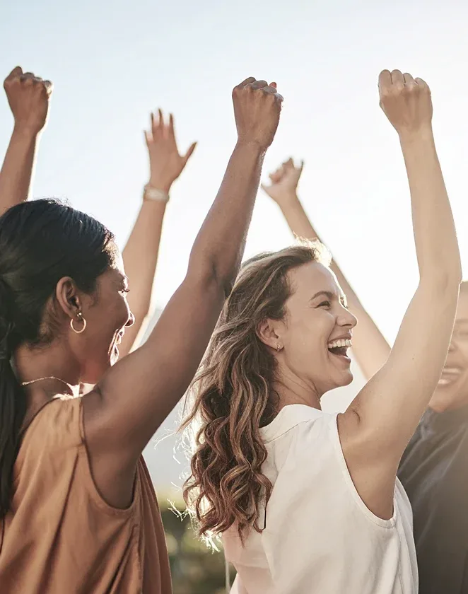 Women celebrating together in the mastermind