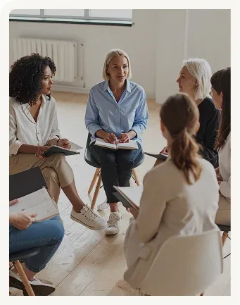 Women supporting each other in a circle