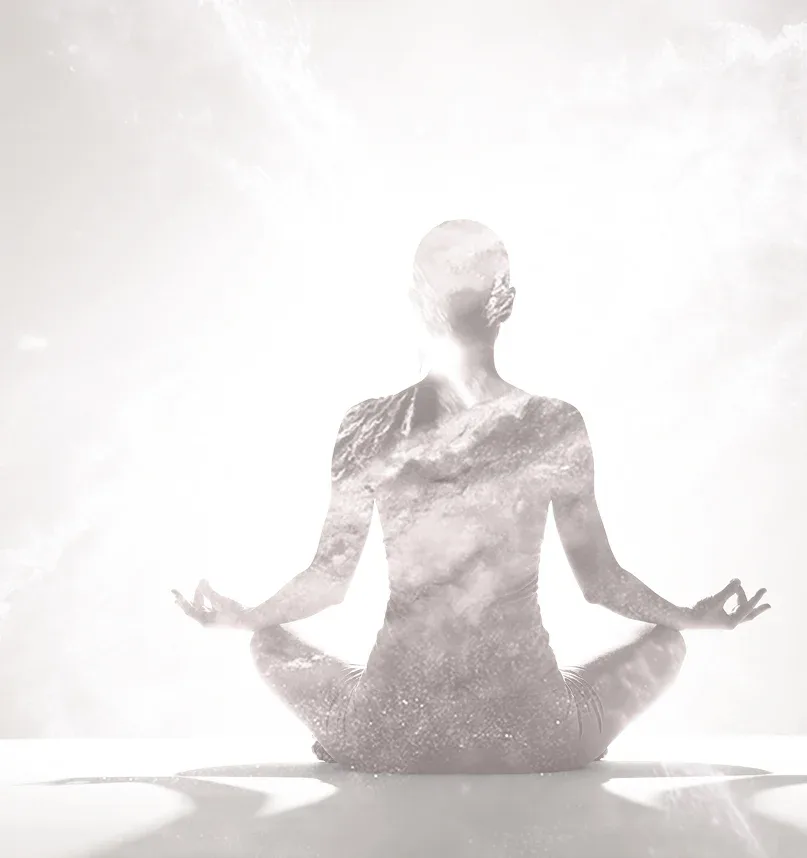 Woman meditating in soft light